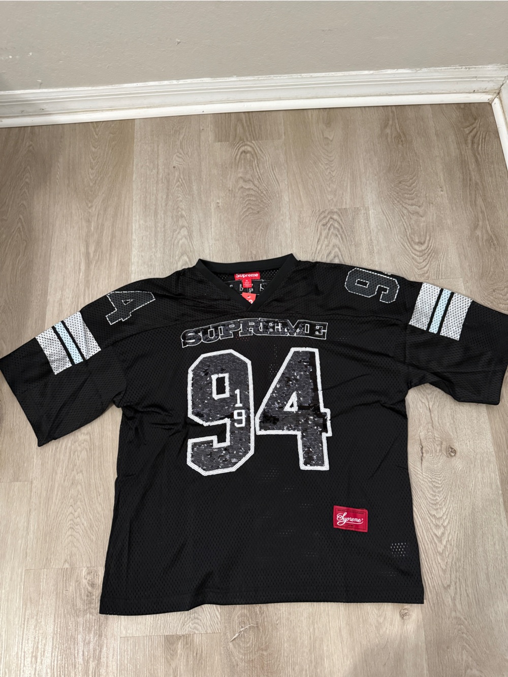 Supreme Black Mesh Football Jersey with White Number 94